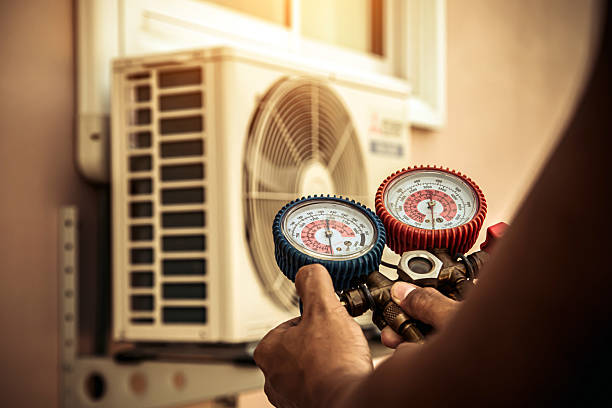 Professional Hvac technician working in Matthews, GA
